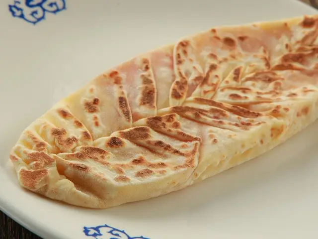 Китайская кухня: Китайские лепешки на водке с мясом и имбирем