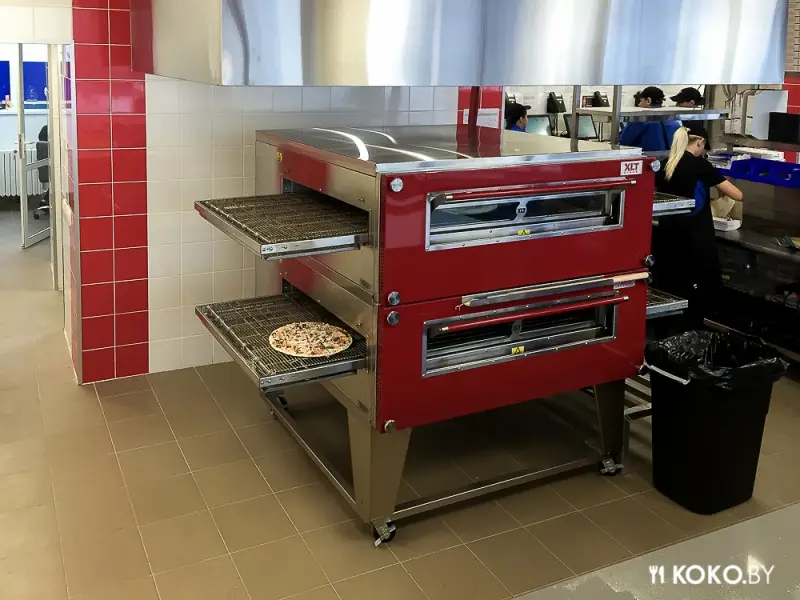 Минск: Сегодня в ТЦ «Рига» открылась вторая по счету пиццерия «Domino's Pizza»